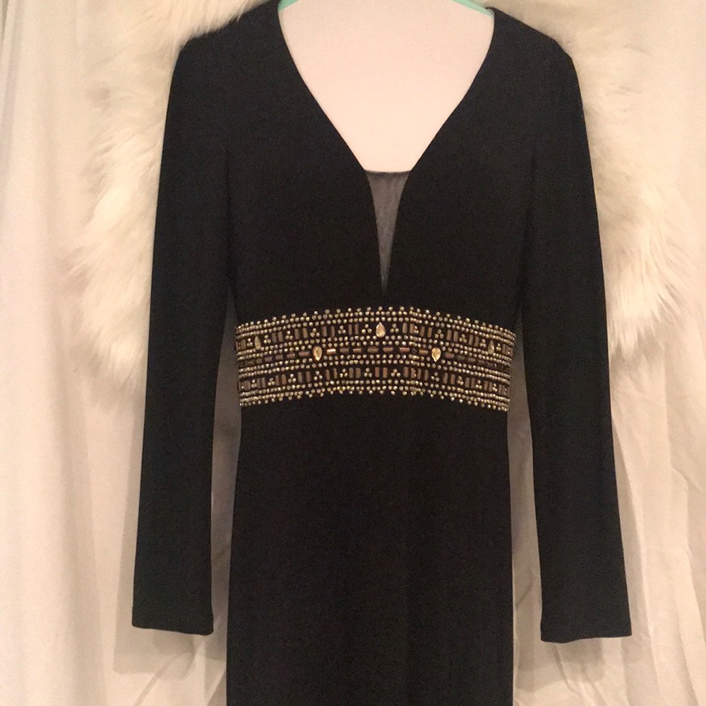 Long, black, beaded formal gown